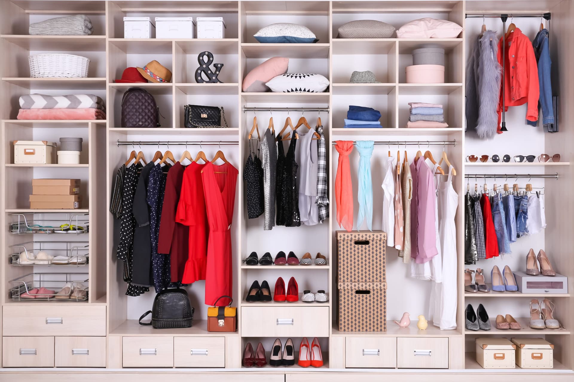 Beautifully organized closet by Home Organizers Los Angeles